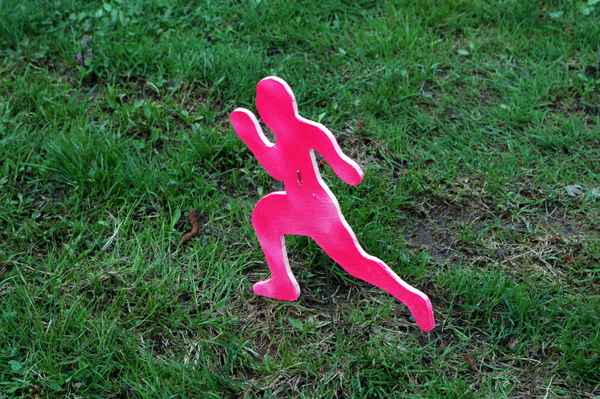 Pinke Lauffigur