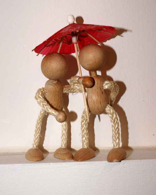 Holzmännchen im Regen