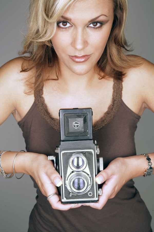 Frau mit Kamera