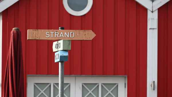 Wegweiser zum Strand