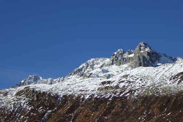 Mittagstock über Andermatt