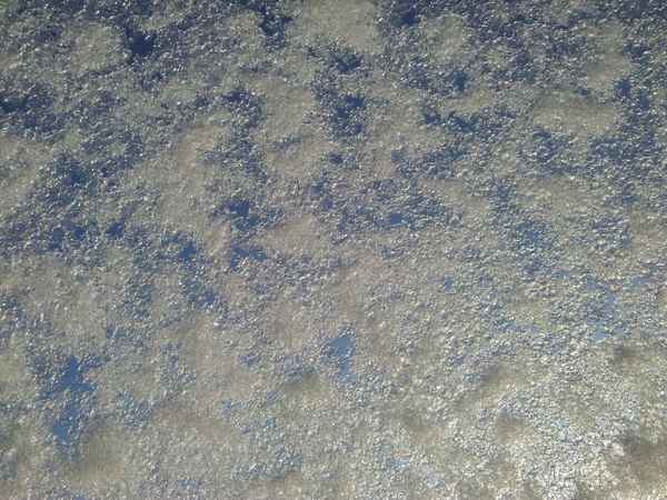 Frost hinter Fensterscheibe
