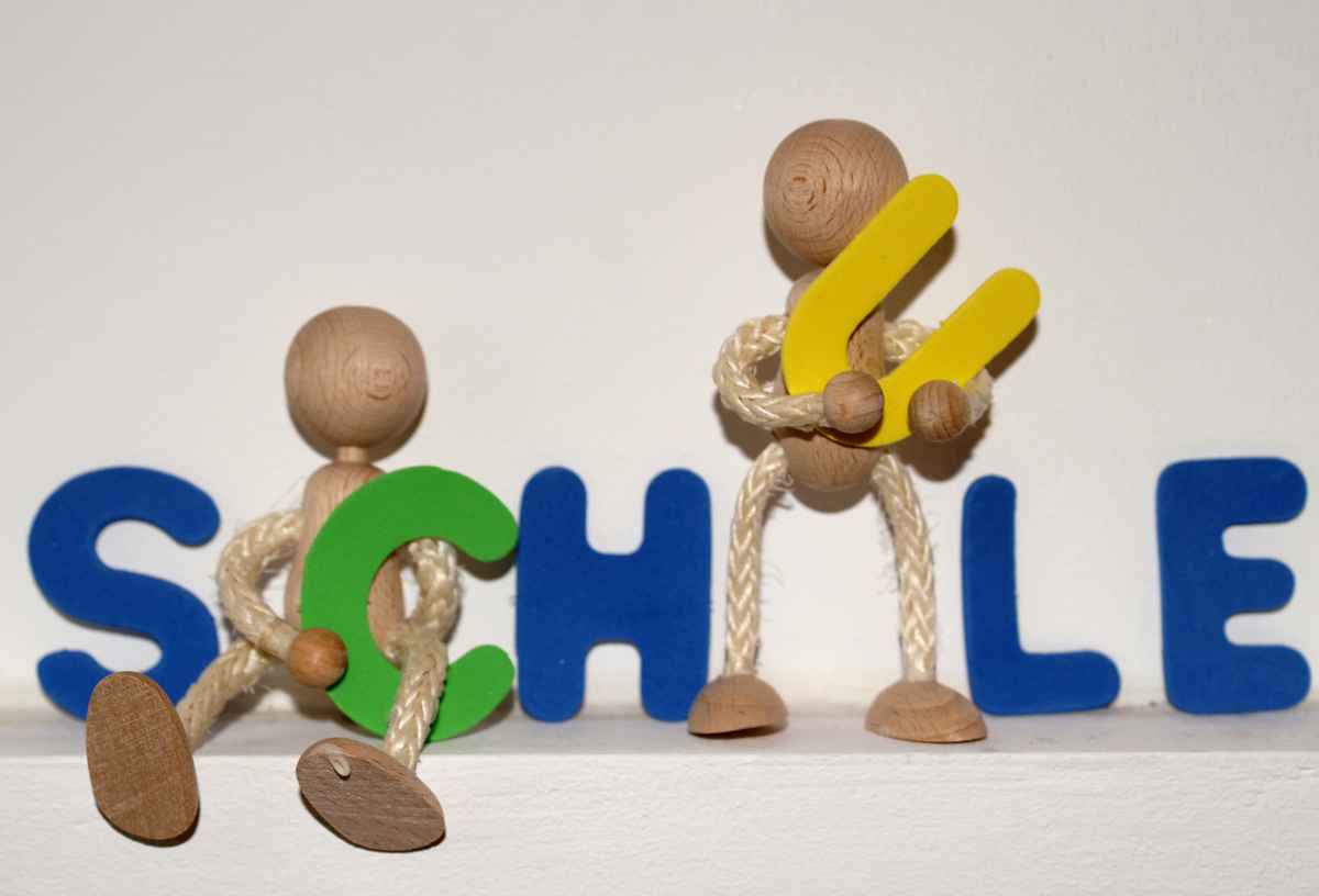 Holzmännchen Schule