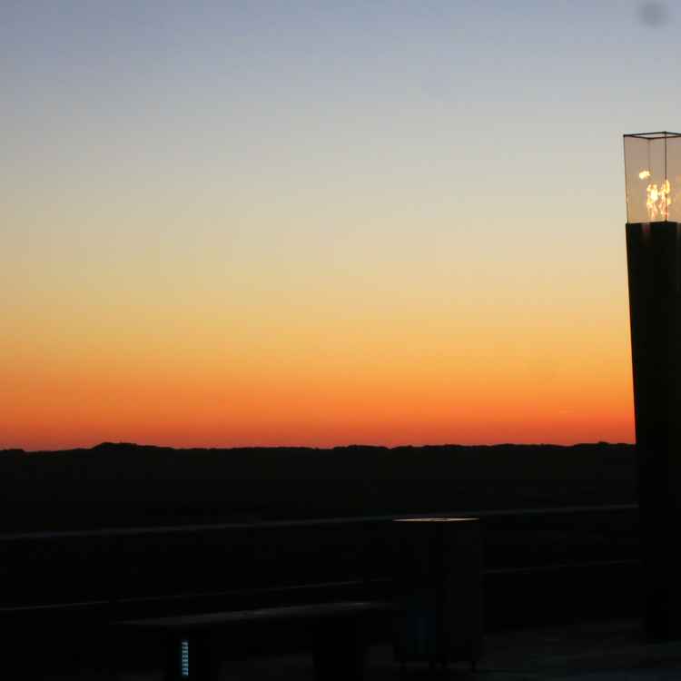 Fackel im Abendlicht