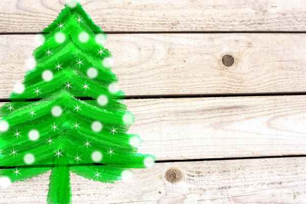 Tannenbaum auf weißem Holz-Hintergrund