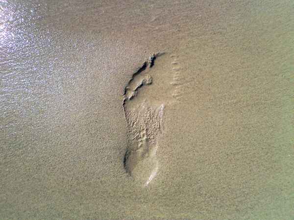 Fußabdruck im Sand