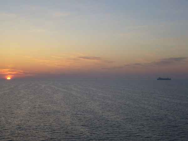 rising sun meets ferryboat