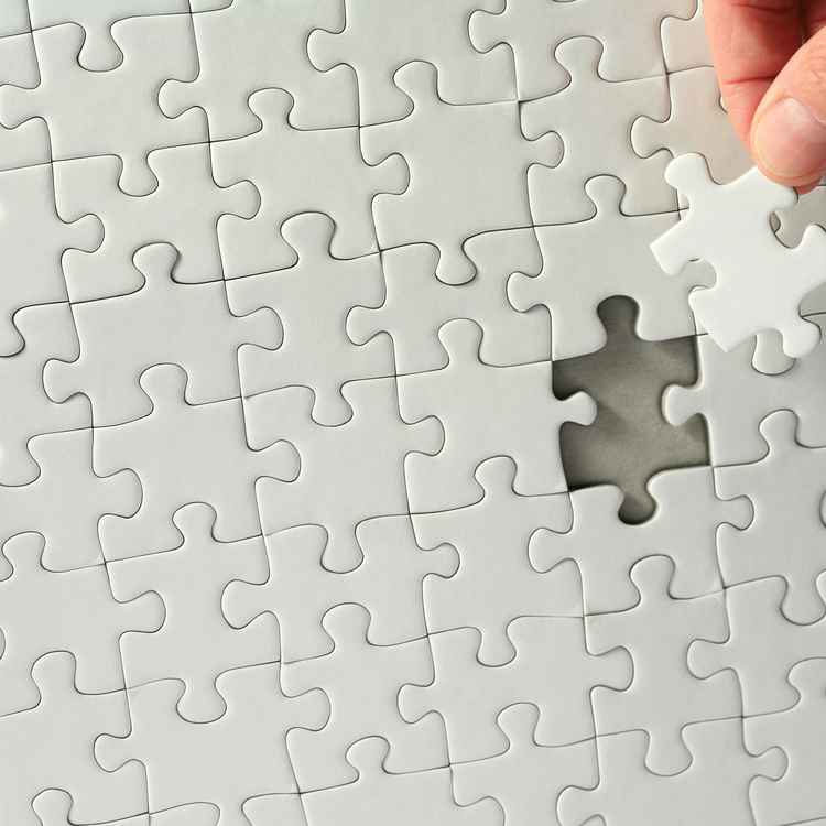 Puzzle mit Hand