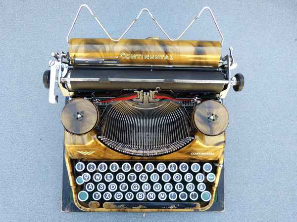 Goldene Continental Klein-Conti Schreibmaschine