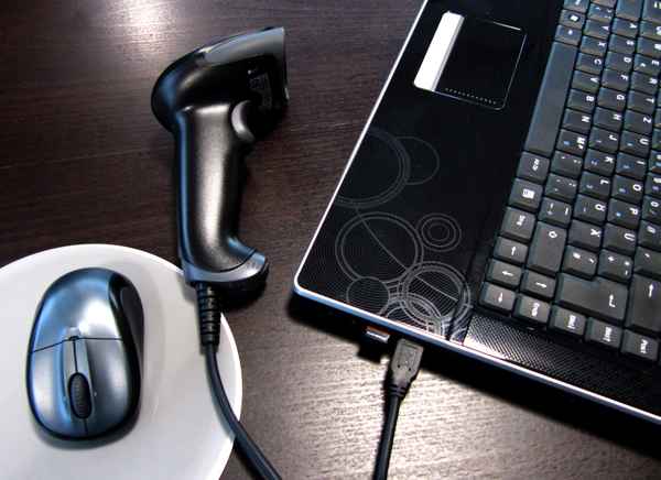 Verkauf mit Laptop und Scanner