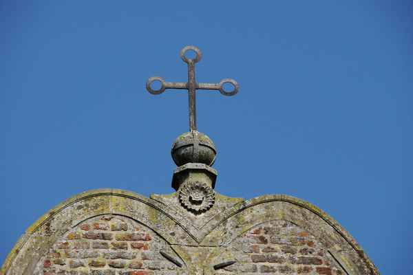 Das Kreuz auf der Weltkugel