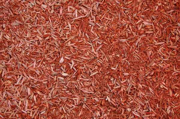 Textur roter Rindenmulch