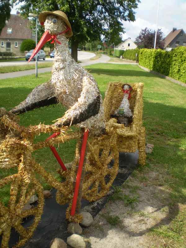 Storch auf dem Fahrrad