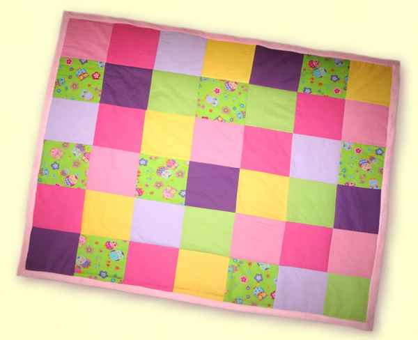 Patchworkdecke in Frühlingsfarben