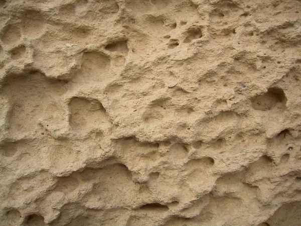 von Wind und Wetter zerfressener Sandstein