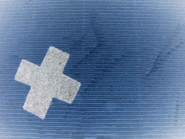 weißes Kreuz auf Blau