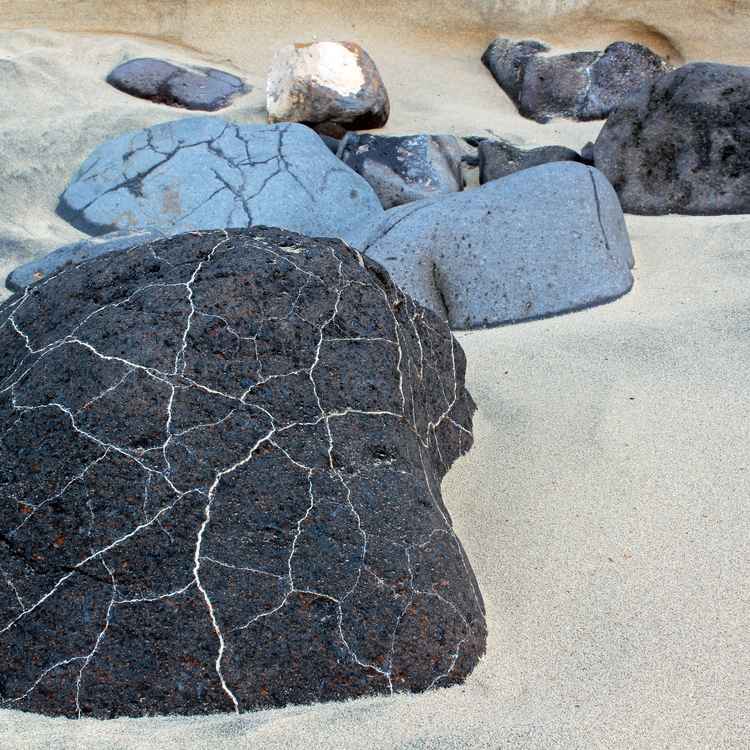 Black stone on the beach
